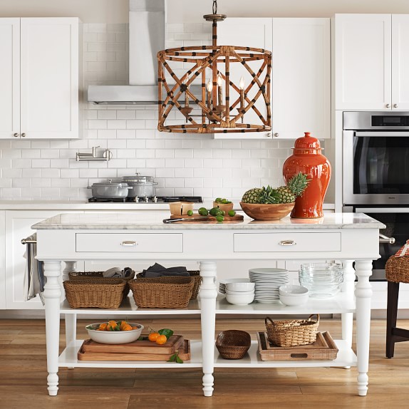 kitchen island with marble top and seating